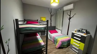 Cama o camas de una habitación en Villa Campoamor