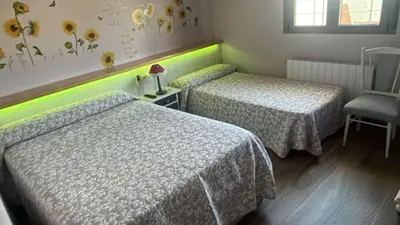 Cama o camas de una habitación en Villa Campoamor