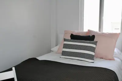 Cama o camas de una habitación en WISH SUITE BASILICA