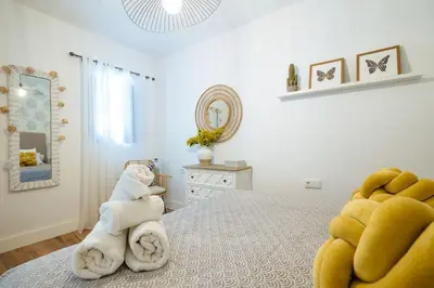 Cama o camas de una habitación en NEW APARTMENT IN TRADITIONAL BUILDING OF THE XVI CENTURY