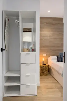 Cama o camas de una habitación en LINEROS SUITE