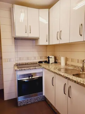 Una cocina o zona de cocina en Apartamento La Muralla