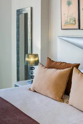 Cama o camas de una habitación en Geysotur Gran Capitán Uno