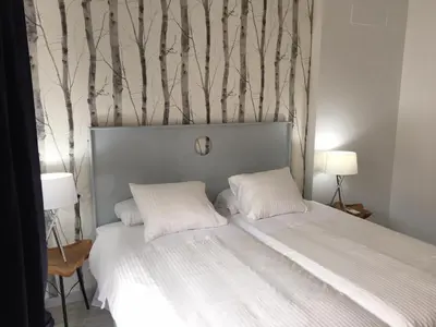 Cama o camas de una habitación en Correduria Premium Apartments