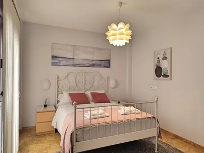 Cama o camas de una habitación en Amplio y Moderno Apartamento Lorenzo Ferreira
