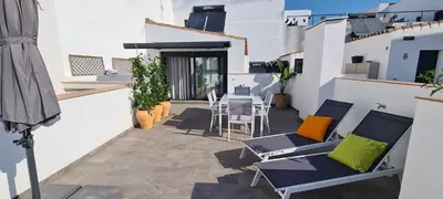 Un balcón o terraza de Atico en Puerta Osario