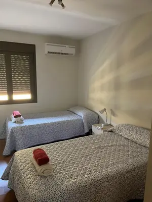 Cama o camas de una habitación en Apartamento en Luis Montoto, Nervión. Céntrico
