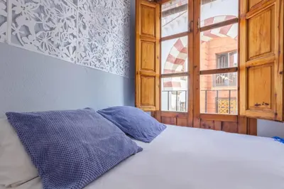 Cama o camas de una habitación en Apartamento Ilusión Andaluza