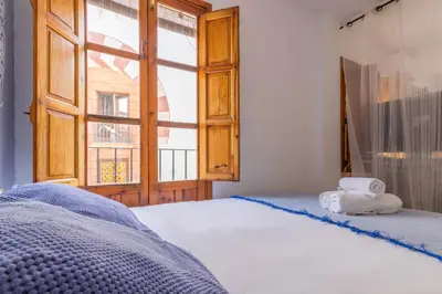 Cama o camas de una habitación en Apartamento Ilusión Andaluza