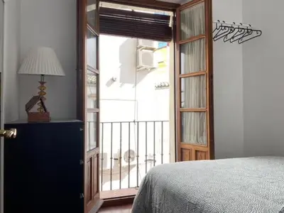 Cama o camas de una habitación en Hispalis San Julian