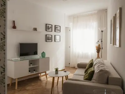 Una televisión o centro de entretenimiento en Apartamento Verdeo Cordoba Centro