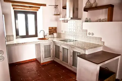 Una cocina o zona de cocina en CR La Cuadra