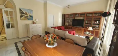 Una televisión o centro de entretenimiento en Apartamento loft tendillas