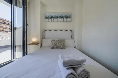 Cama o camas de una habitación en Córdoba Terrace Apartment