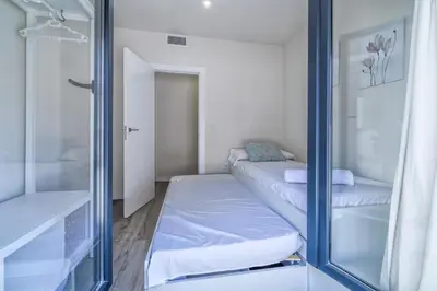 Cama o camas de una habitación en Córdoba Terrace Apartment