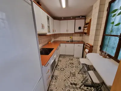 Una cocina o zona de cocina en Vivienda Turística en Alcázar Viejo San Basilio