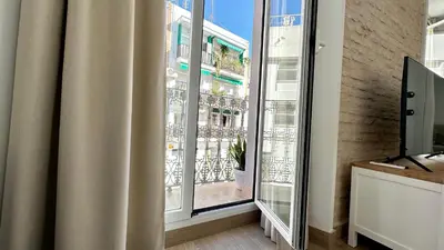 Una televisión o centro de entretenimiento en Mata Mua Suites