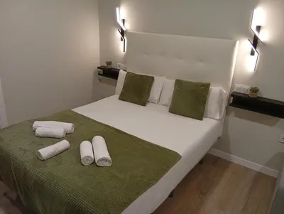 Cama o camas de una habitación en Ribera Home