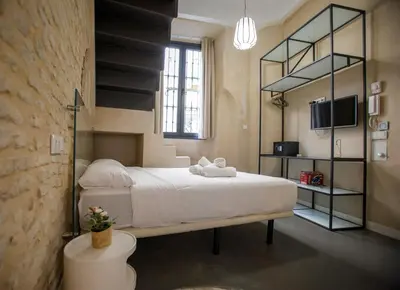 Cama o camas de una habitación en Cardenal Cervantes II