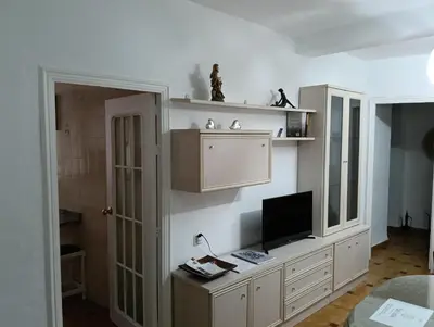 Una televisión o centro de entretenimiento en Apartamentos San Antón 2