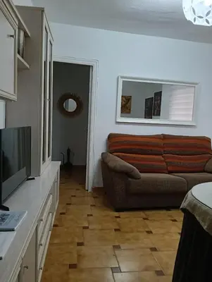 Una televisión o centro de entretenimiento en Apartamentos San Antón 2