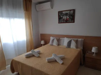 Cama o camas de una habitación en Victoria Home Córdoba