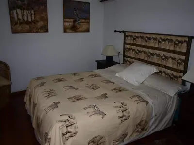 Cama o camas de una habitación en Casa con encanto frente al lago