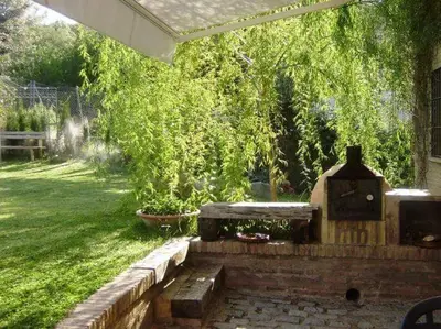 Jardín al aire libre en Casa con encanto frente al lago