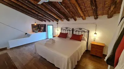 Cama o camas de una habitación en CASA RURAL ZUMBAJARROS