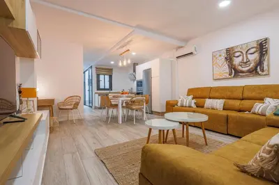 Zona de estar de Family suit principal encantos de Sevilla