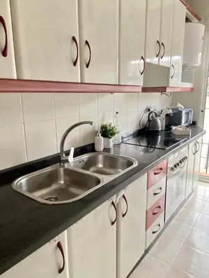 Una cocina o zona de cocina en Apartamento Centro Peña de los Enamorados