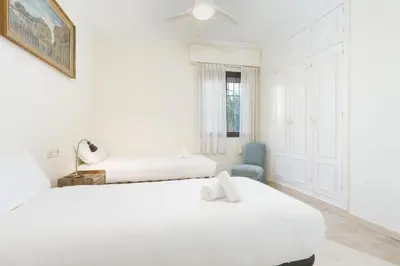 Cama o camas de una habitación en Spacious apartment Garage 3BR2BH Terrace-Alfalfa