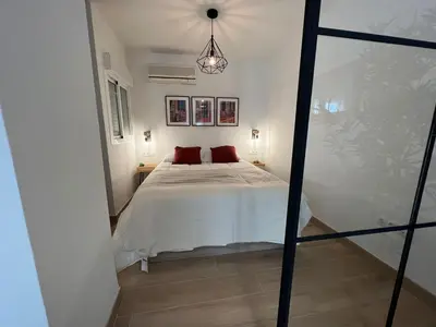 Cama o camas de una habitación en Alameda Sweet Home