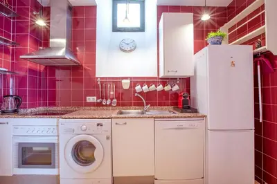 Una cocina o zona de cocina en Vidrio Sevilla Deluxe Apartment
