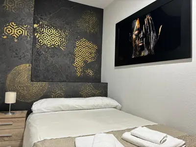 Cama o camas de una habitación en Apartamento céntrico en Plaza San Miguel