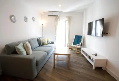 Una televisión o centro de entretenimiento en Apartamentos El balcón de la Trinidad Córdoba - GREAT LOCATION