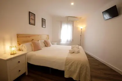 Cama o camas de una habitación en Apartamentos El balcón de la Trinidad Córdoba - GREAT LOCATION
