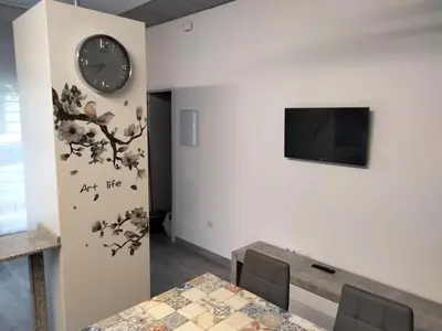 Una televisión o centro de entretenimiento en Loft La Calahorra con posibilidad de aparcamiento Pregunta por el PACK MÁS AMOR