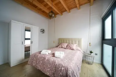 Cama o camas de una habitación en Alameda, Centro by RT Apartments