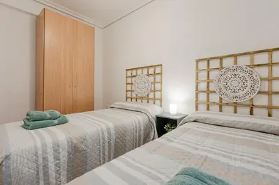 Cama o camas de una habitación en AvantiStays La Judería, vive Sevilla con los cinco sentidos