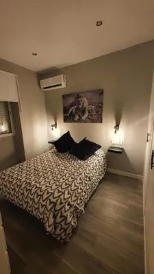 Cama o camas de una habitación en Alojamiento Turístico La Terraza de Córdoba