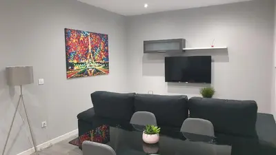 Una televisión o centro de entretenimiento en Alojamiento Turístico La Terraza de Córdoba
