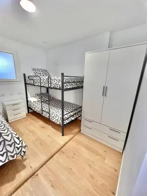 Cama o camas de una habitación en APARTAMENTO CAMINO DEL RIO