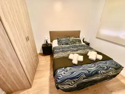 Cama o camas de una habitación en APARTAMENTO CAMINO DEL RIO