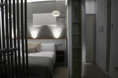 Cama o camas de una habitación en La Cúpula