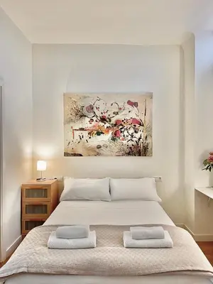 Cama o camas de una habitación en El Apartamento de Trini en la Alameda
