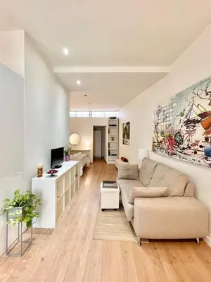 Zona de estar de El Apartamento de Trini en la Alameda