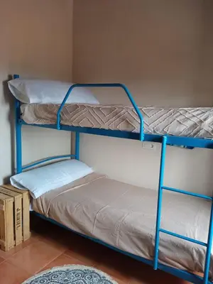 Cama o camas de una habitación en Cortijo La Torquilla Laguna Fuente de Piedra
