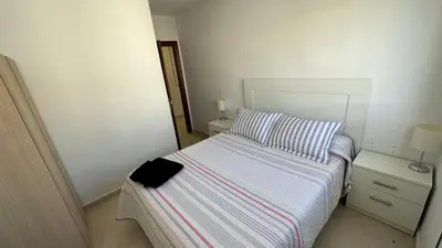 Cama o camas de una habitación en APARTAMENTO el CARMEN