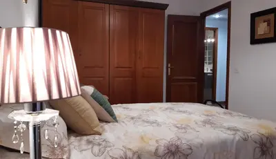 Cama o camas de una habitación en APARTAMENTO SAN LORENZO